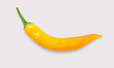 Orange or Yellow chilli on a white background