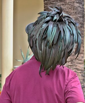 Cappello piumato