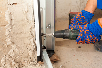 Professional worker install garage doors at new house