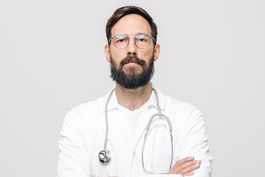 close-up portrait of young male doctor in uniform with stethoscope. medical concept