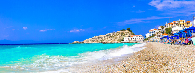 Greece travel. Most  beautiful village and beaches of Samos island - Kokkari. Popular tourist...