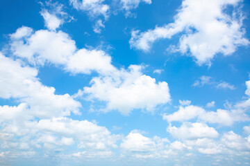 Fototapeta na wymiar Blue sky and white clouds. Beautiful nature background. Summer vibes.