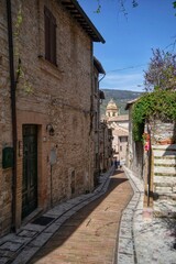 narrow street in the old town of Spello, Umbria, Italy