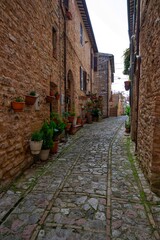 narrow street in the old town of Spello, Umbria, Italy