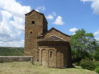 Romanesque Church of San Andres in the village of Satue. View of the apse and bell tower. 11th century.  Serraglo Region. Aragon. Spain. 