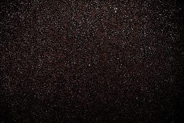 Dark glistening empty surface, base material for use in graphic design.