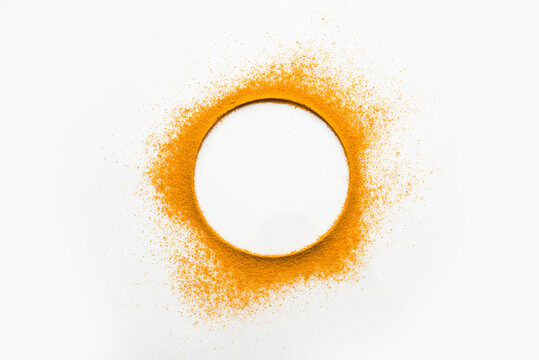 Haldi or Turmeric Powder Ring on the white background, selective focus  Stock Photo | Adobe Stock
