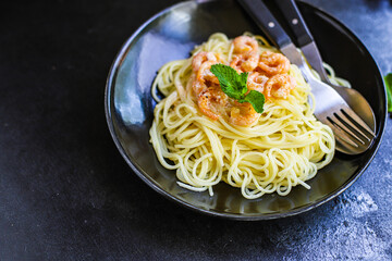 pasta shrimp spaghetti creamy seafood sauce main dish food background top view copy space for text organic healthy eating