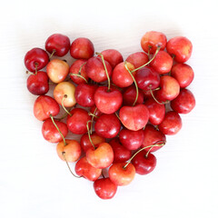 heart of sweet cherry berries. concept love of summer