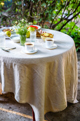 coffee and breakfast on the table tea party, coffee break outdoor food background top view copy space for text organic healthy eating