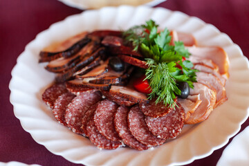 Sausage slicing on a plate