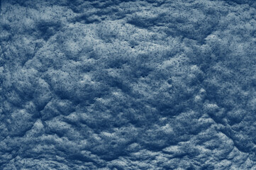 Abstract blue background. Light blue background resembling the texture of the sea.