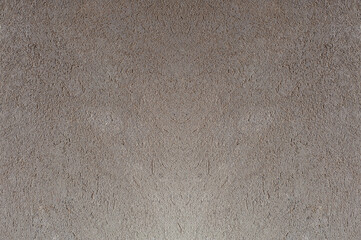 Light gray-brown symmetrical wall texture background. 
