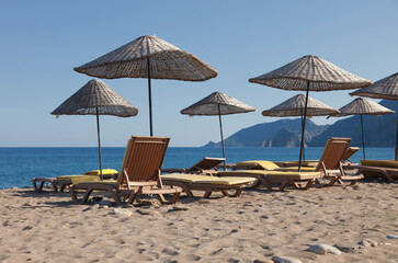 Beach Umbrellas with Sun Loungers on Beach