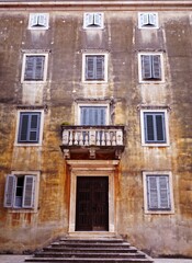 Old Rustic Residential Building with Window Shutters and a Balcony, Zadar, Croatia