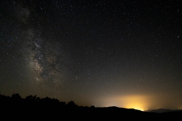 Fototapeta na wymiar Starry landscape with the Milky Way from Sierra de Tormantos. Extremadura.