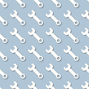 White wrench icon, tools on pale blue background, seamless pattern. Paper cut style with drop shadows and highligts. © adelyne