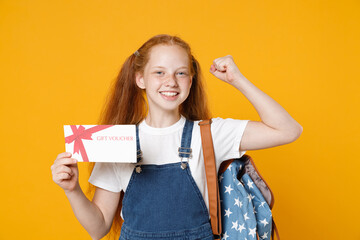 Young school teen kid girl 12-13 years old in white tshirt backpack hold in hand gift certificate...