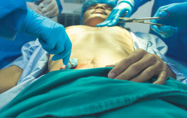 Medical team doing surgical operation at hospital