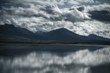 Mountains reflected in a lake. East Iceland landscape