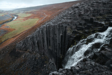 Studlafoss waterfall with basalt columns in East Iceland