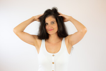 Fototapeta premium Pretty young woman with long black hair making gesture