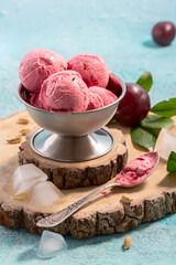 Plum and cream ice cream with cardamom.