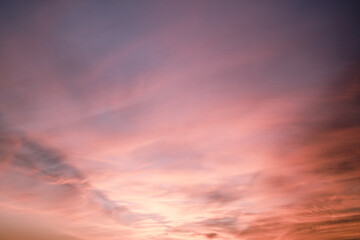 Fototapeta na wymiar pink and purple sunset sky with clouds