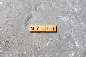 myths word written on wood block. myths text on table, concept