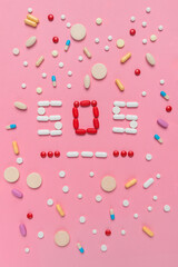 SOS morse code with medical drugs and pills