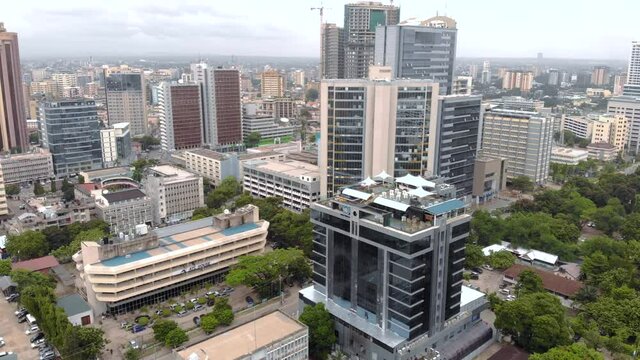 Aerial Flyby View of the Dar es Salaam Downtown skyline in cloudy weather