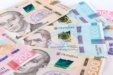 Ukrainian money is one thousand, five hundred and two hundred hryvnias. National currency. Corruption in Ukraine. Enterprise capital investment, finance, savings, bank and people concept. Close-up