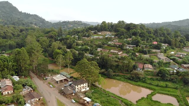 Aerial Flyby Shot of Lushoto Town based in Tanga Region of Tanzania, Remote calm district in Usambara Mountains in East Africa