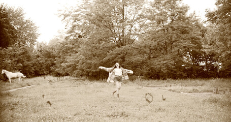 happy hippie girl revolves around herself. stylized film