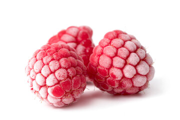 frozen raspberries isolated on white
