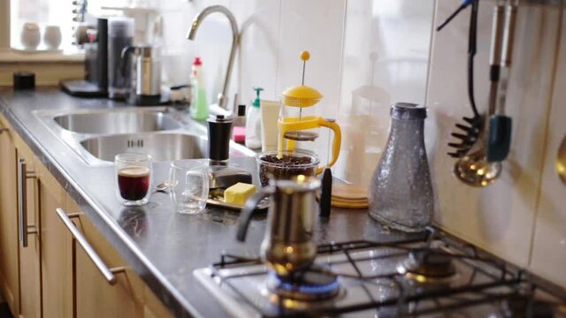 Top view person preparing bulletproof coffee with pods