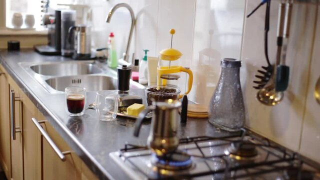 Top view person preparing bulletproof coffee with pods