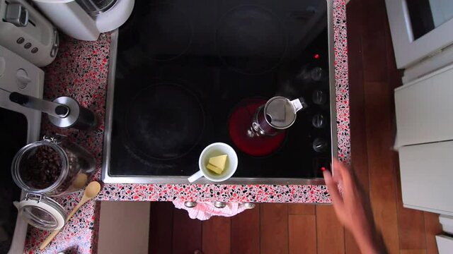 Top view person preparing bulletproof coffee with pods