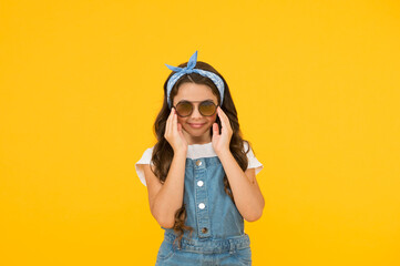 Little fashionable girl summer outfit with sunglasses, cute fashionista concept