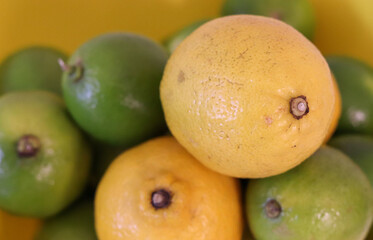 Beautiful lemons arranged on a table. A fruit rich in vitamin c.