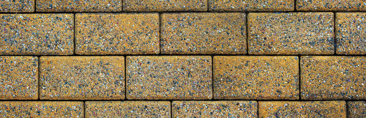 Yellow brick floor. Panorama. Background and texture.