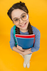 What would you like to read. Happy library reader yellow background. Little girl hold library...