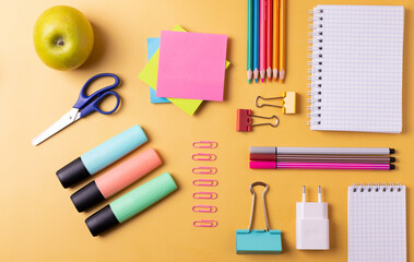 student's or office desk with stationary