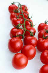 tomatoes cherry on a white background