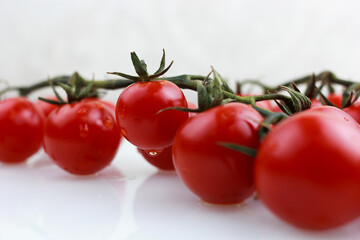 tomatoes cherry on a white background