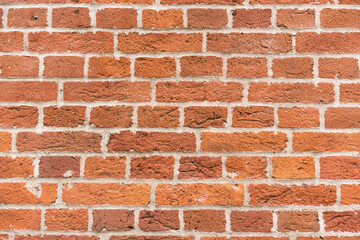 brick red wall texture. background of a old brick house.
