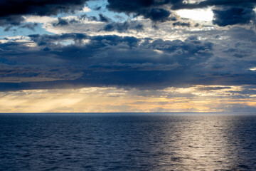 Fototapeta premium Dark grey storm clouds over ocean