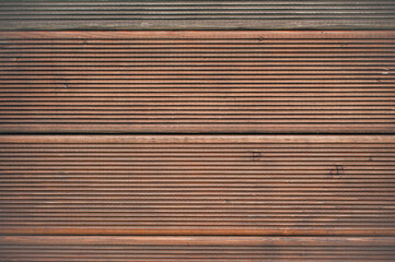Wood brown texture or background, horizontal stripes. Close up. Copy space