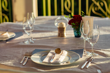 beautiful table setting, with dishes, food, in a summer cafe