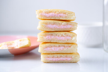 A stack of strawberry mini cakes